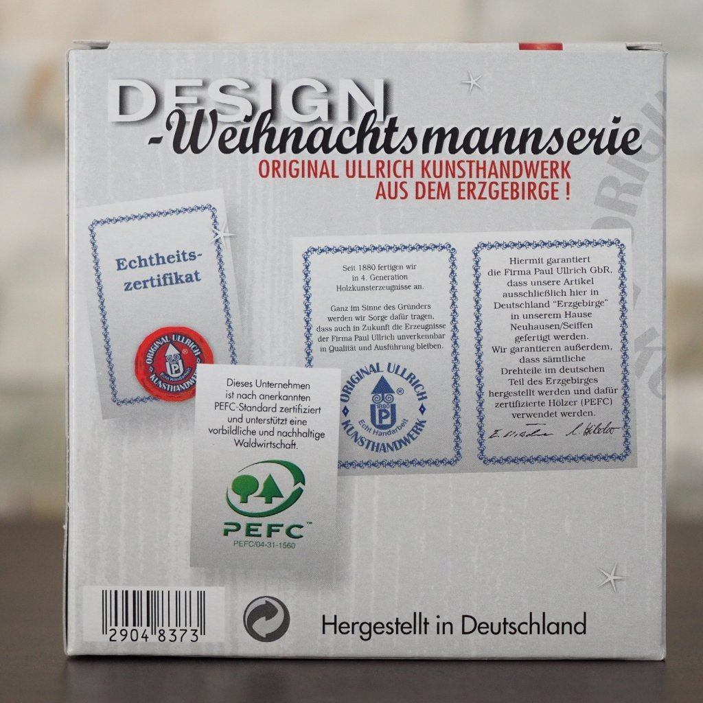 Weihnachtsmann Collectibles - Santa topping his Tree